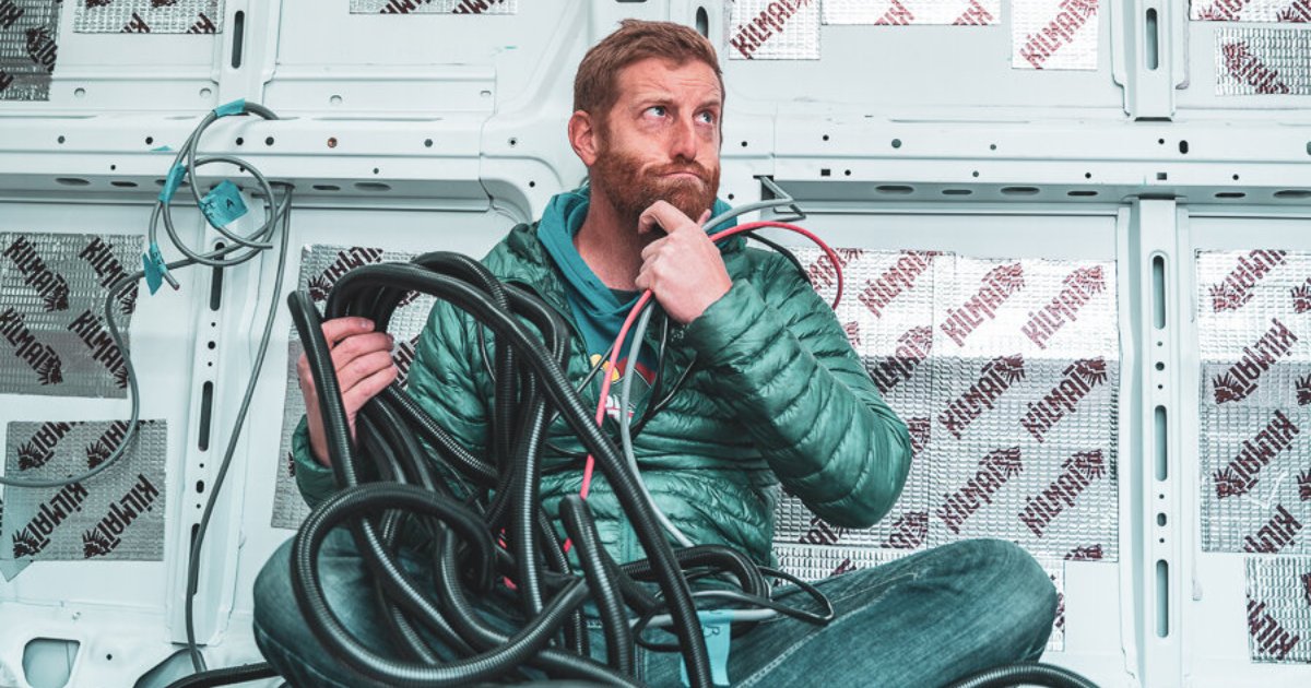 eric hanson holding electrical equipment for a van backpacking and hiking landscape photography