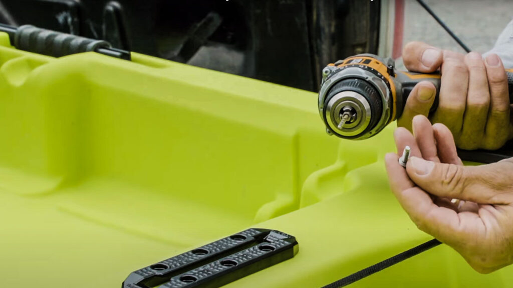 Drilling technique for attaching gear tracks on a kayak