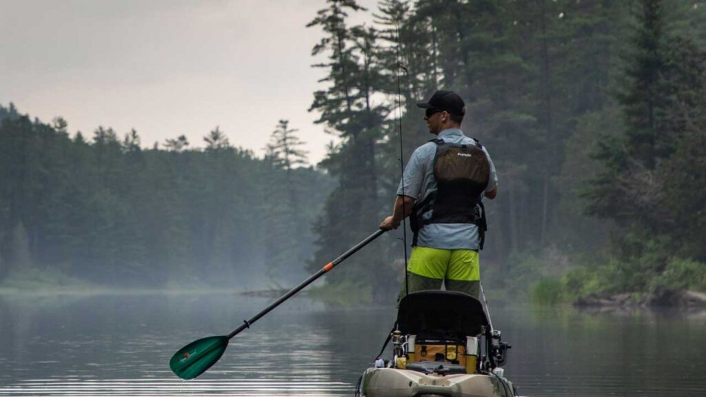 kayak lifejackets and PFD should be on at all times when on the water, where a kayak helmet doesn't need to be worn in flat water.