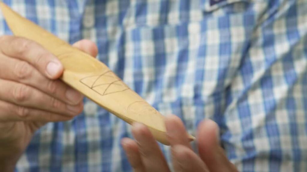 reason for kayak rudder or kayak skeg: weather cocking occurs in a cross wind