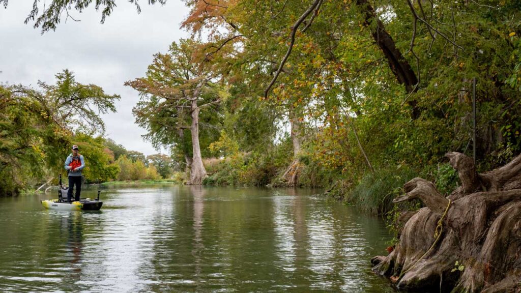 Working the shoreline while fishing for black bass in Texas
