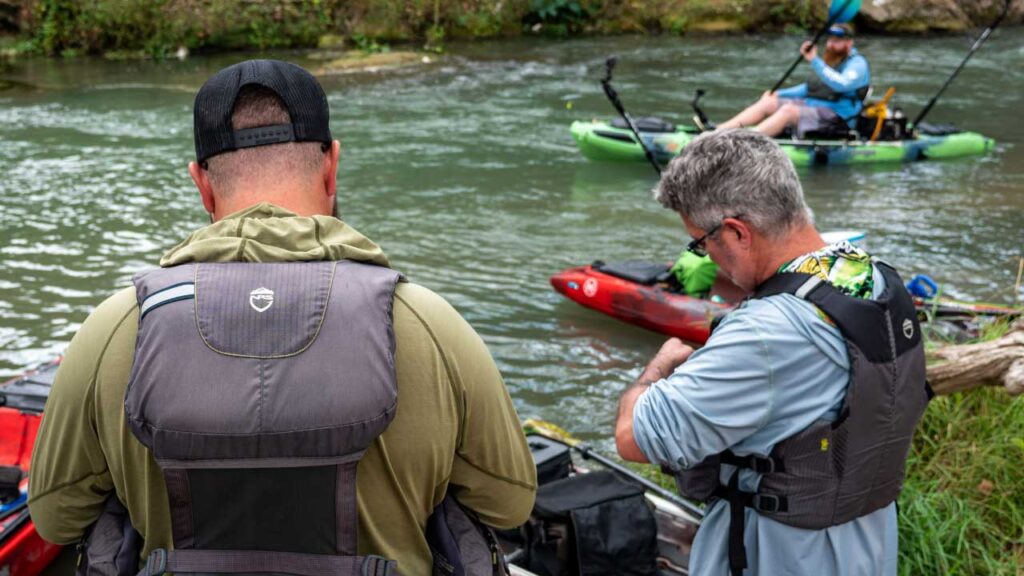 Taking turns on the Coosa X surfing a small wave