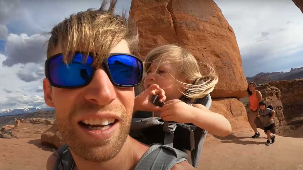 Parker hitching a ride with Nick as we roam through the arches.