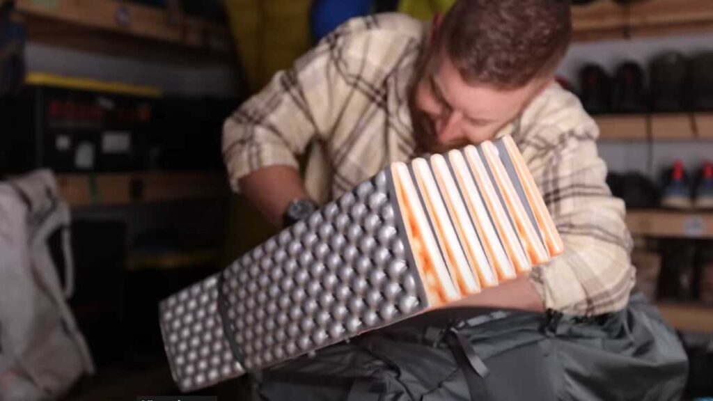 Mystery Ranch Bridger 45 backpack review by Eric Hanson: The cam straps at the bottom and the top could use a bit more length.