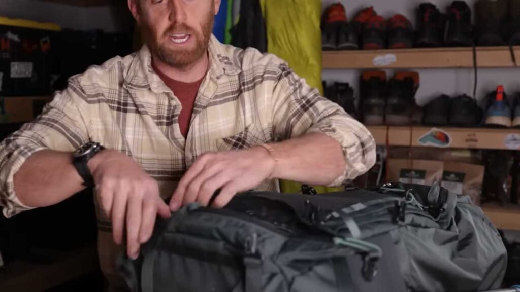 Bridger 45 overnight backpack review by Eric Hanson: The sleeping bag compartment on the Bridger 45 has great straight zipper access and a compression strap built in.