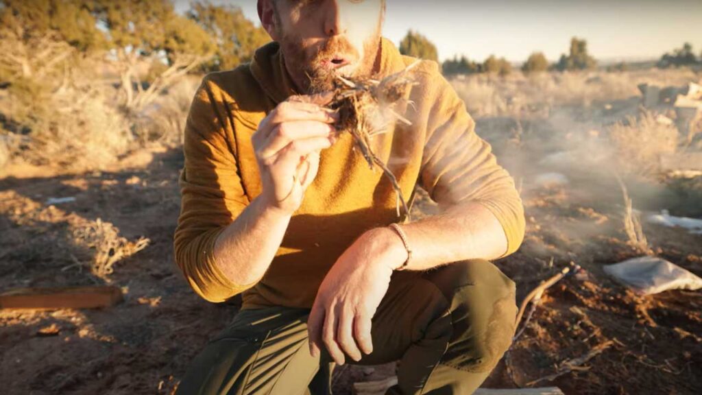 How to Start a Fire in the Wild with Sticks Tip: Hold your nest to the fireboard till the next begins to smolder enough to start a fire.