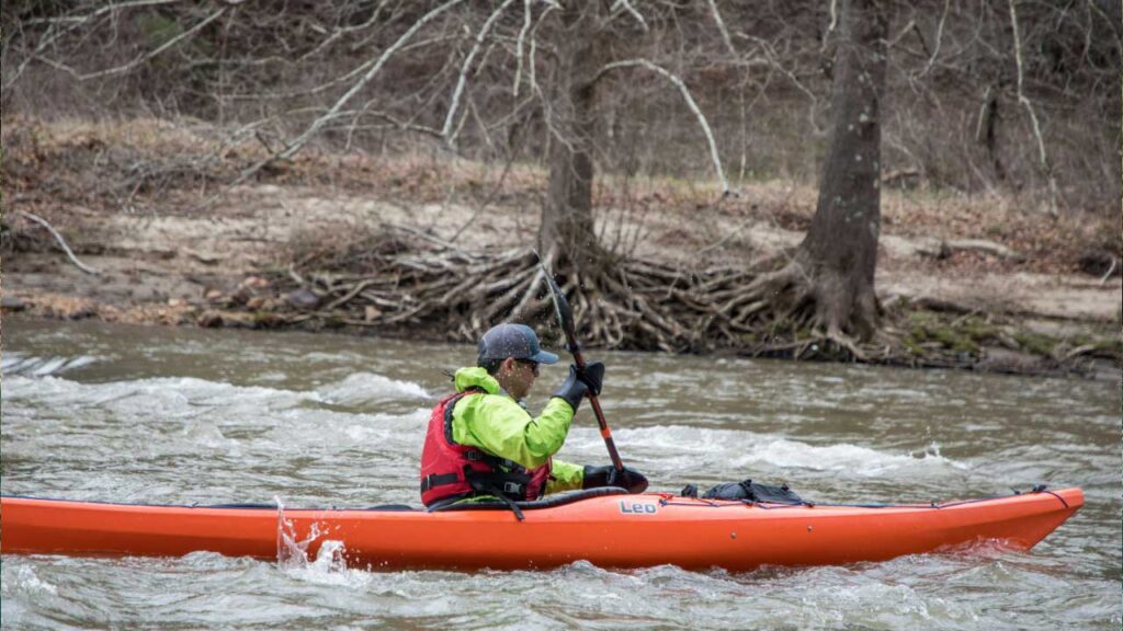 Cold water, cold air but not a lot of submerging equals a splash jacket, like this NRS Riptide.