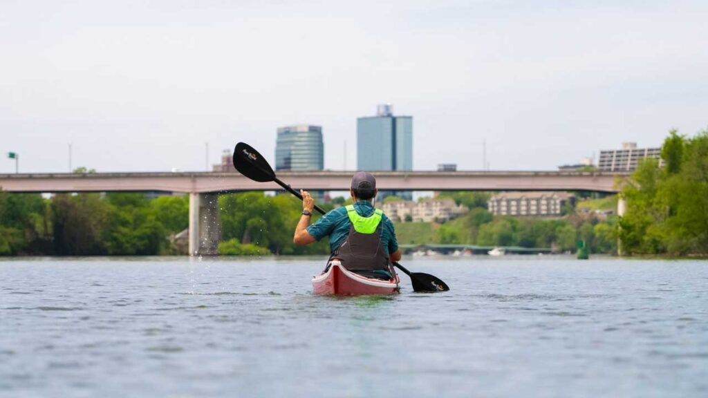 Kayaking Tennessee RiverLine towards the City of Knoxville.