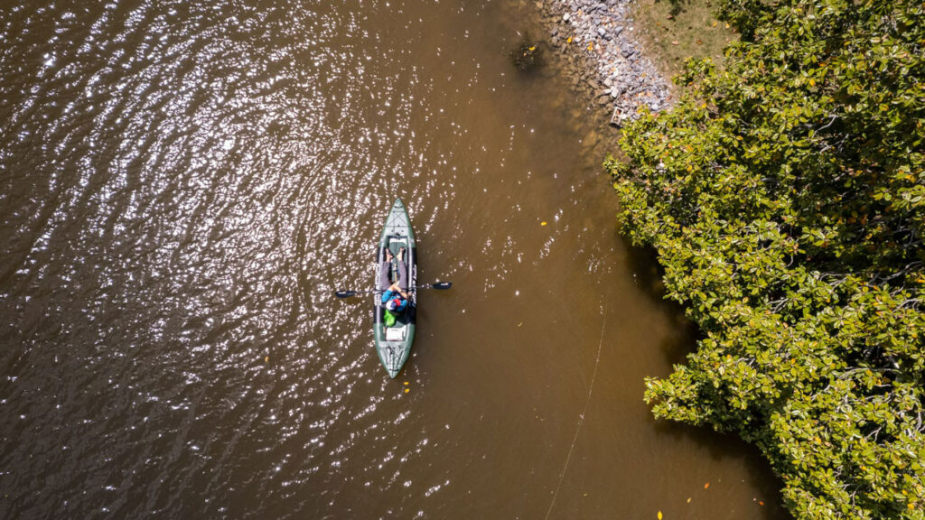Working the shoreline of Watts Bar Lake fishing in an inflatable kayak.